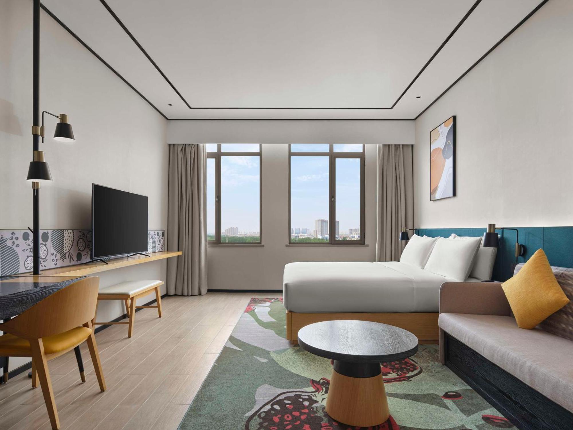 Hilton Garden Inn Tianjin Huayuan Экстерьер фото